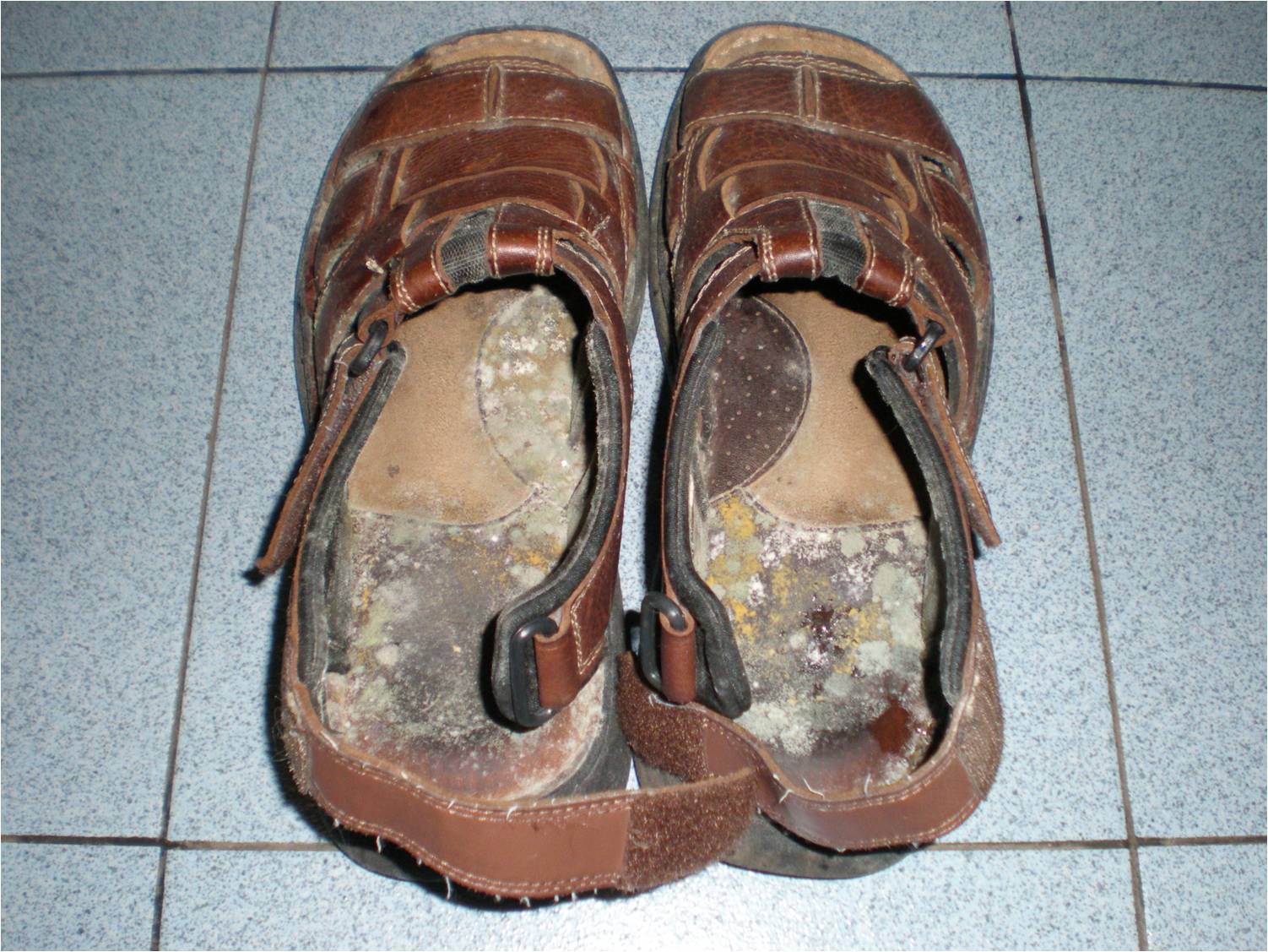 Dirty Smelly Leather WorkBoots- No More!! Do not submerge sandals with leather parts in water during your efforts to clean them. Follow up with a fabric protectant to help keep your sandals clean for longer periods of time. Filed Under: Cleaning Guides, Shoes, Accessories and Other Stuff Tagged With: shoes.